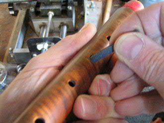  the recorder: polishing a hole with abrasive paper